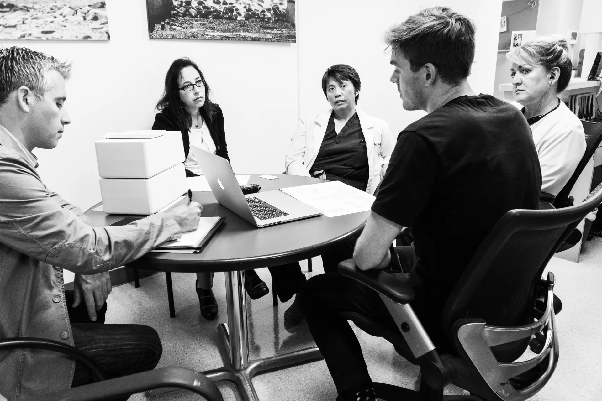 Researchers observing and taking part in a field session
