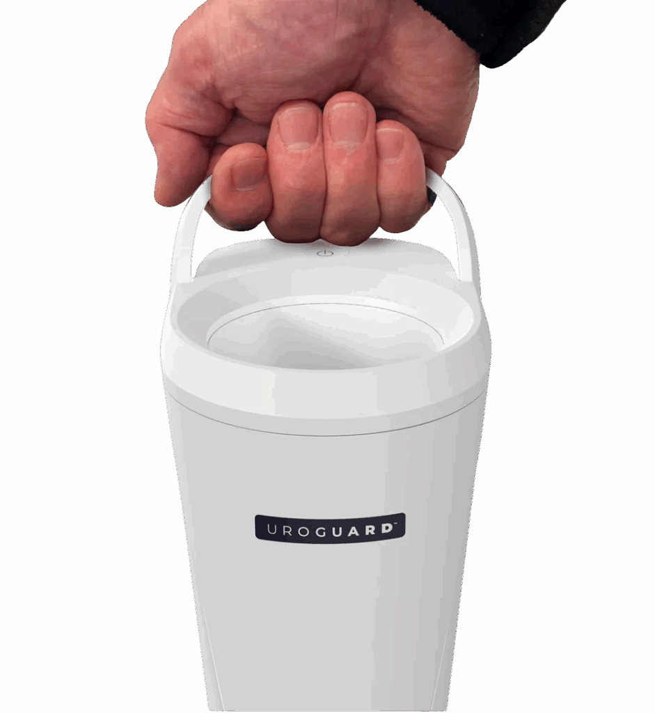 A hand holds a white container labeled UROGUARD by its top handle.