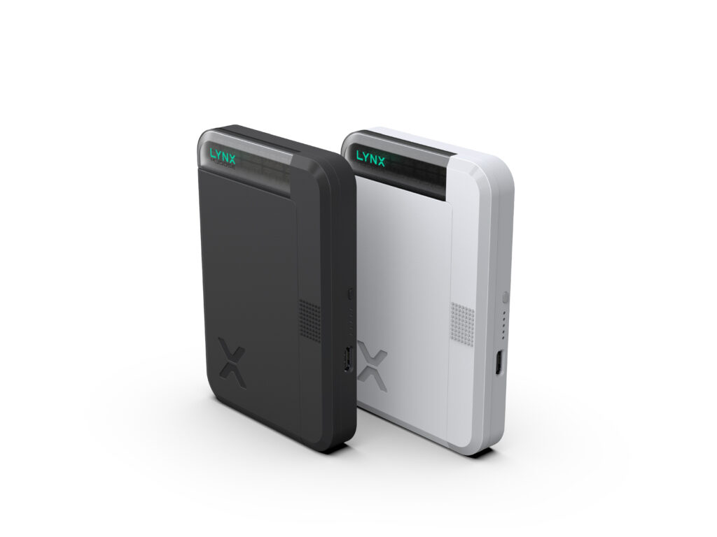Two rectangular LYNX devices, one black and one white, each labeled LYNX.