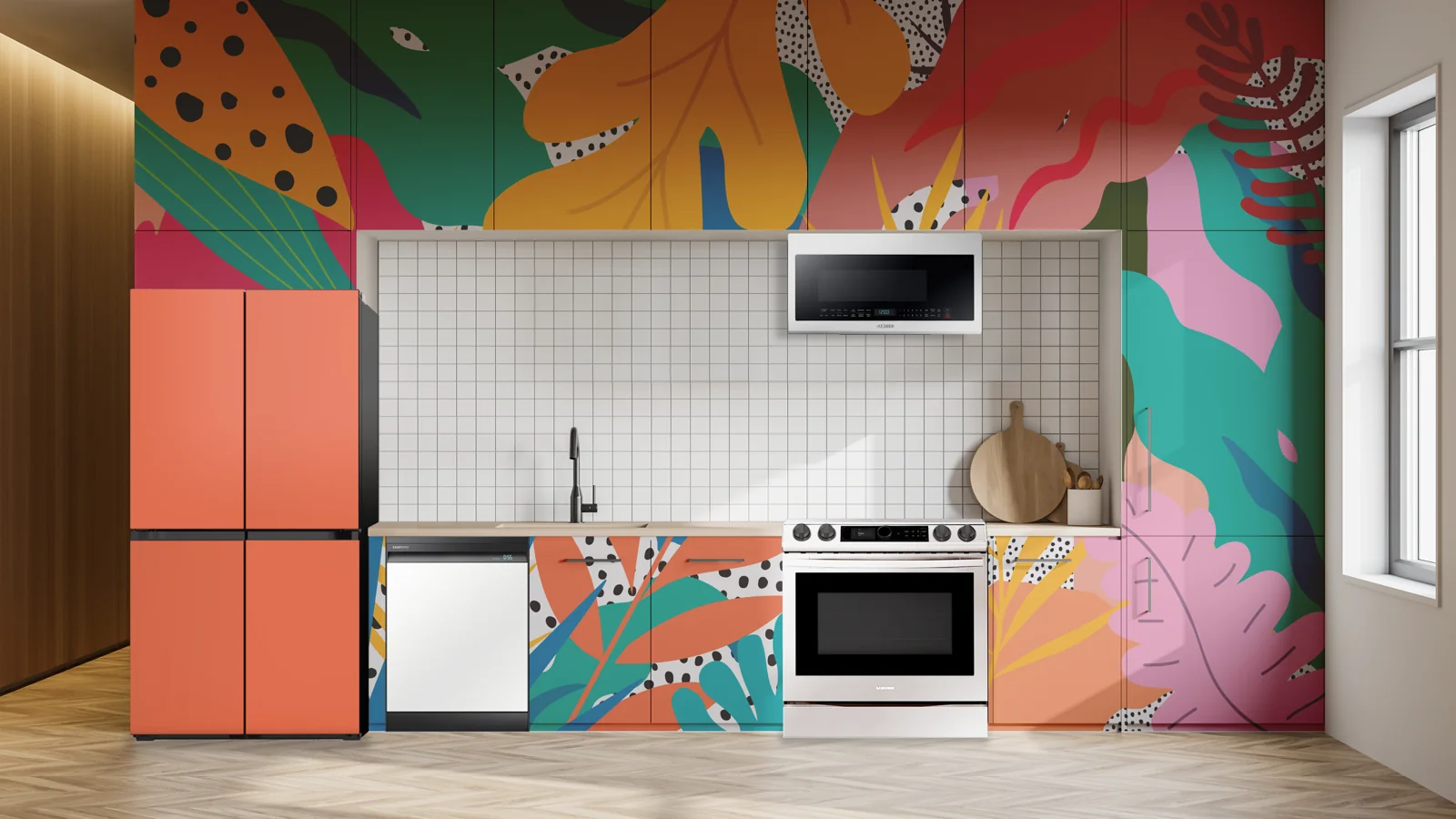 A kitchen with a coral Samsung Bespoke refrigerator and a botanical mural carried across the appliance panels and walls.