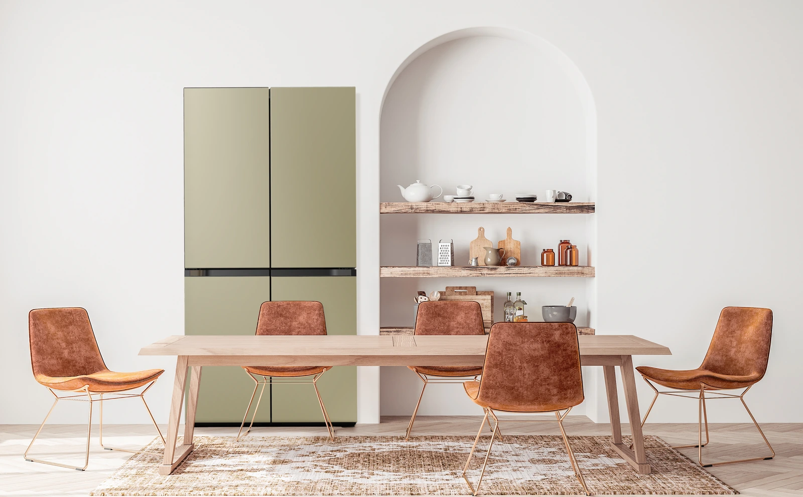 A Samsung Bespoke refrigerator with sage panels set into an arched alcove beside a dining table.