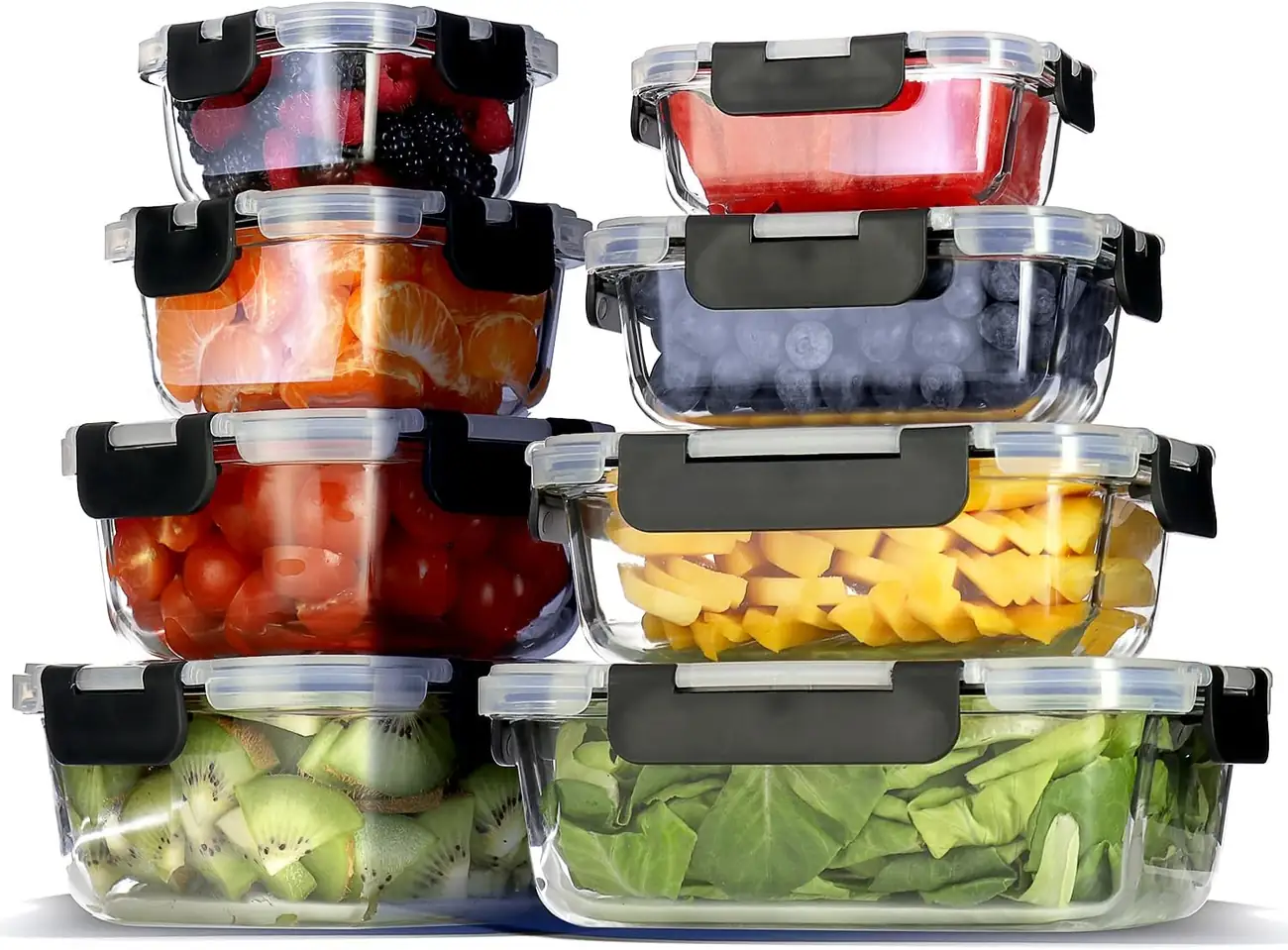 Eight Zyliss containers filled with fruit, vegetables and greens, stacked in two columns.