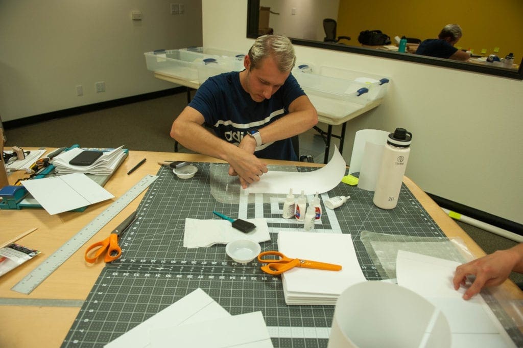 Zeke creating prototypes for Lego