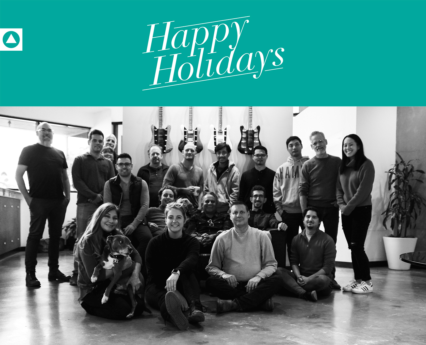 Holiday card from RKS with students in front of guitars