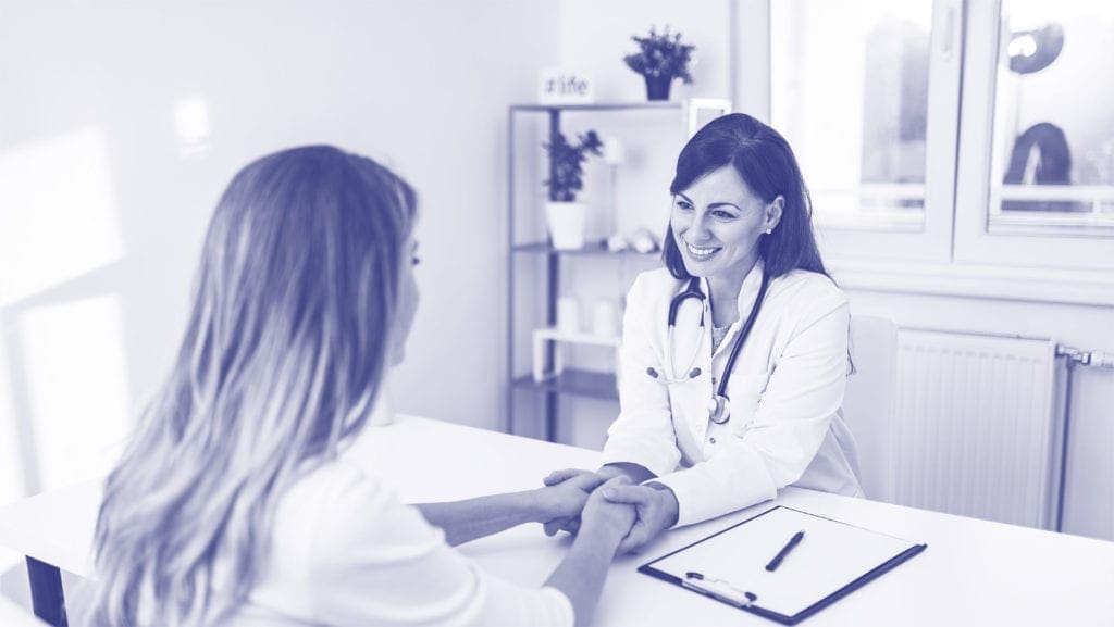 Doctor recommending Talis Biomedical Talis ONE device