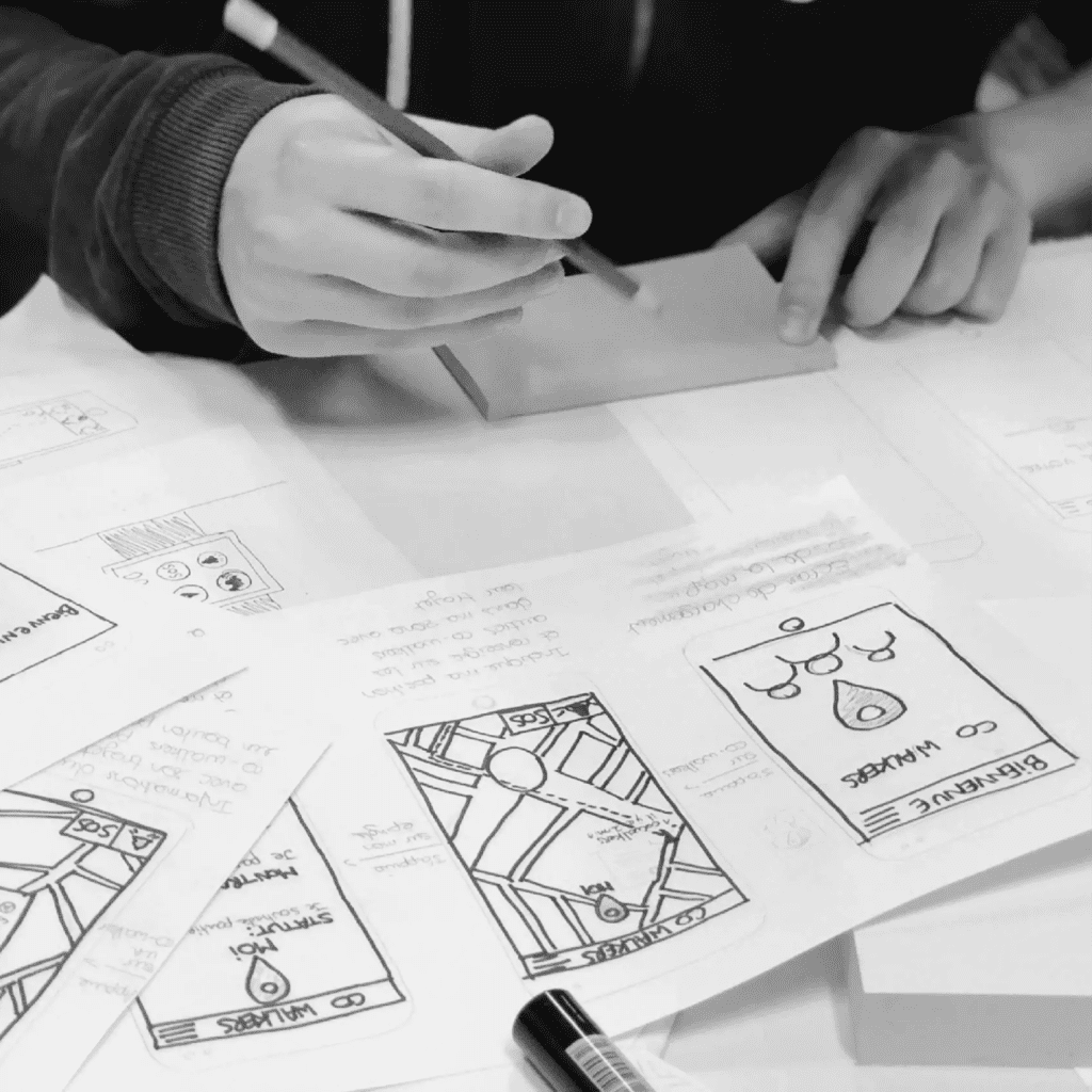 RKS Employee sketching wire frames to design for function and user experience