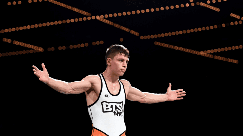 Beat the Streets Cover Image // Wrestler wearing beat the streets branding on singlet