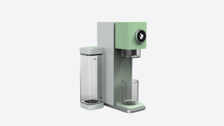 A modern, mint-green and gray coffee machine with a glass placed on its drip tray and a separate transparent water reservoir on the left, against a plain white background.