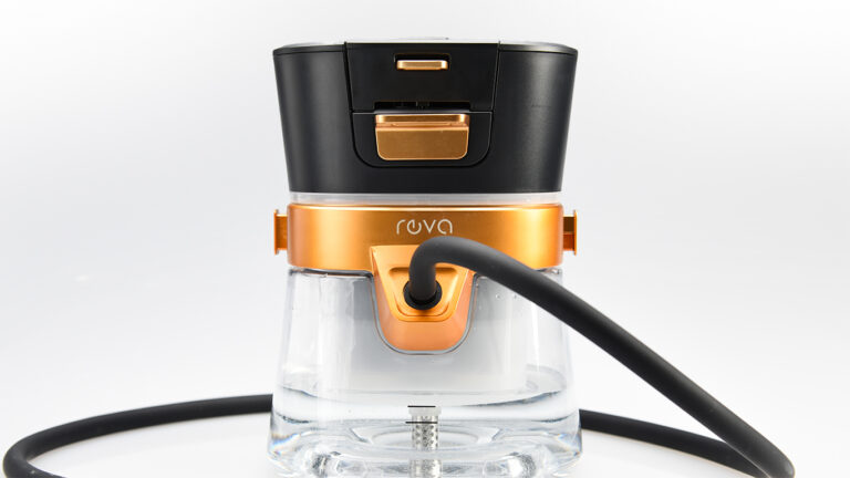 A modern hookah with a transparent glass base, a black and gold upper section, and a black hose attached to the front is displayed on a white background, perfect for showcasing in an Updated Grid or All Grid View.