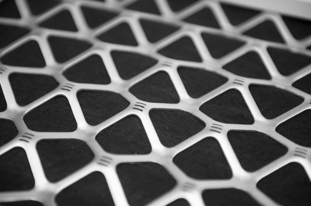Close-up of custom-engineered metal lattice used in RKS materials science for product development.