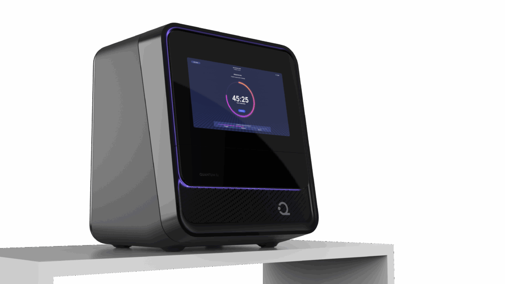 A compact, black desktop device with a touchscreen display showing a timer and progress circle, ideal for the Life Science Market. The screen is bordered by a purple LED light and rests on a white surface.