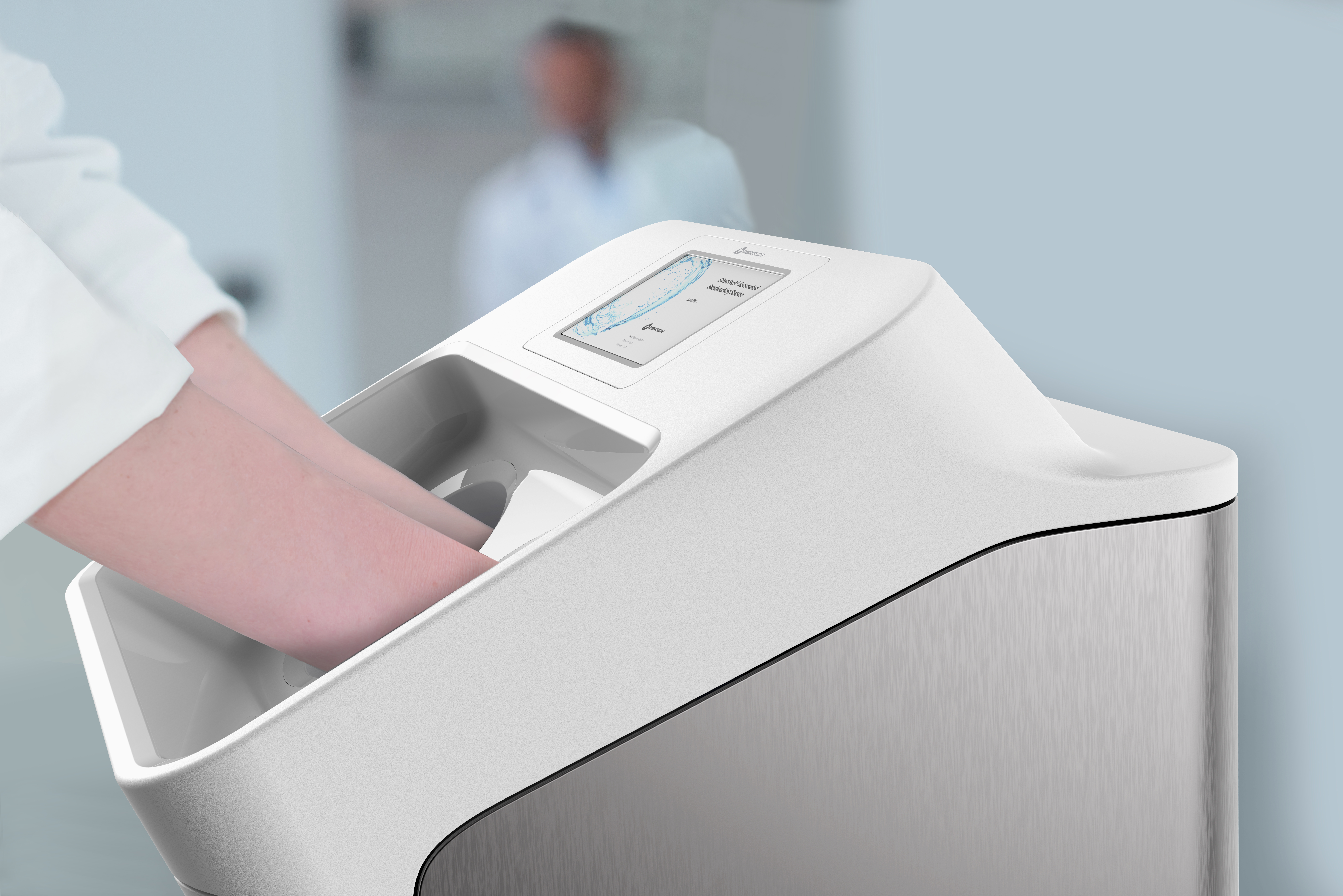 A person inserts their hands into a modern, white medical device with a display screen, likely for hand sanitization or analysis, in a clinical setting.