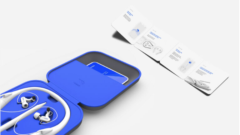 A blue case containing white wireless earphones and a smartphone, with an instruction manual laid out in the background showing setup steps and illustrations.