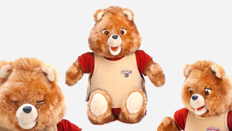 Three views of a classic Teddy Ruxpin bear toy wearing a red shirt and tan vest: front view in the center, left with closed eyes, and right with a cheerful expression, all on a plain white background.